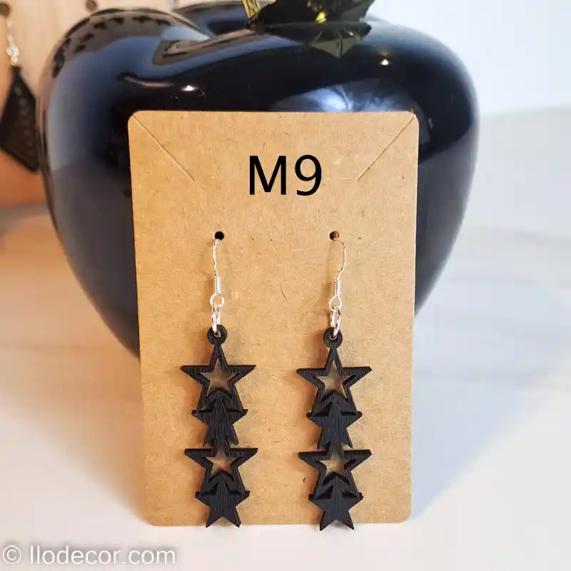 boucles d'oreilles quatuor etoiles noir